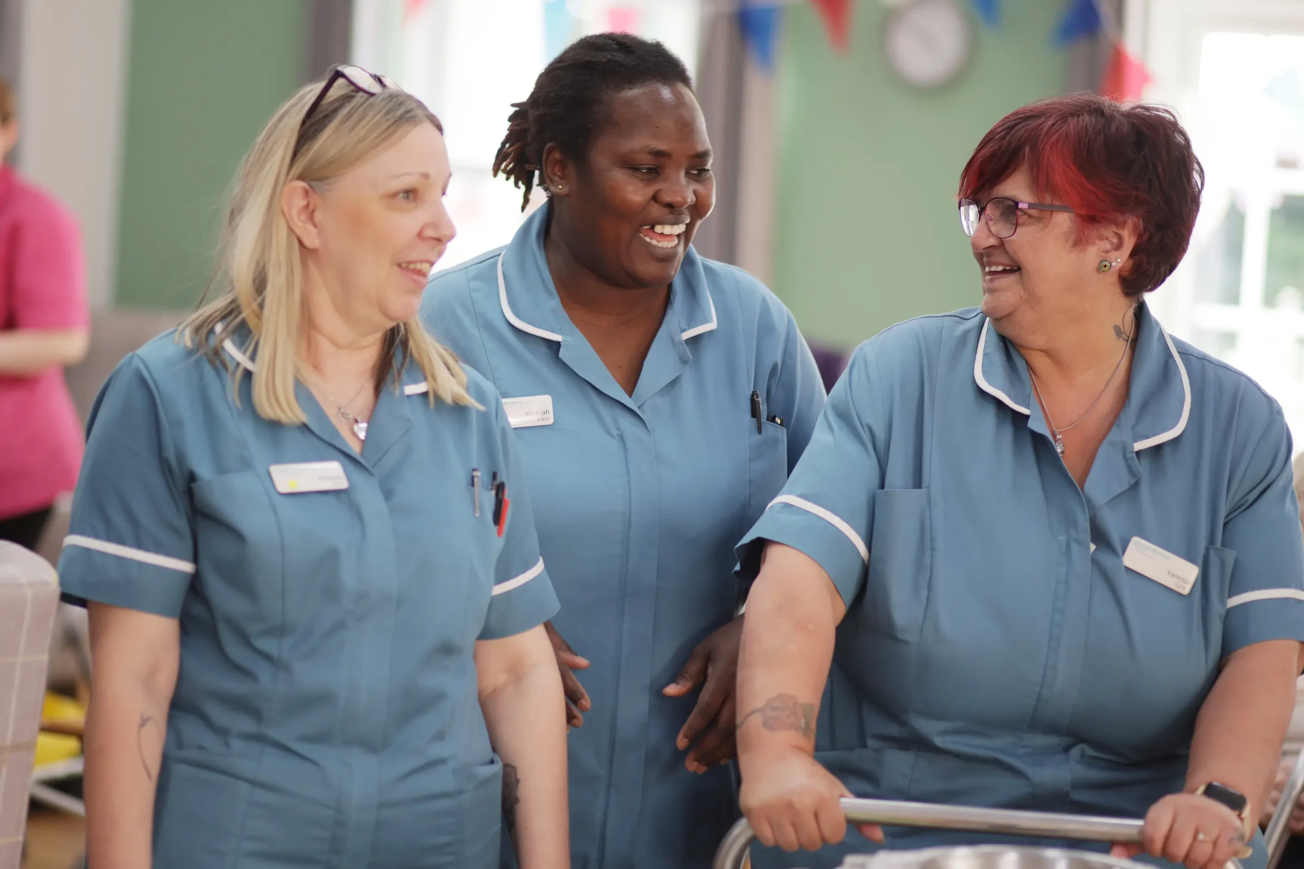 Colleagues at Greensleeves Care interacting with each other