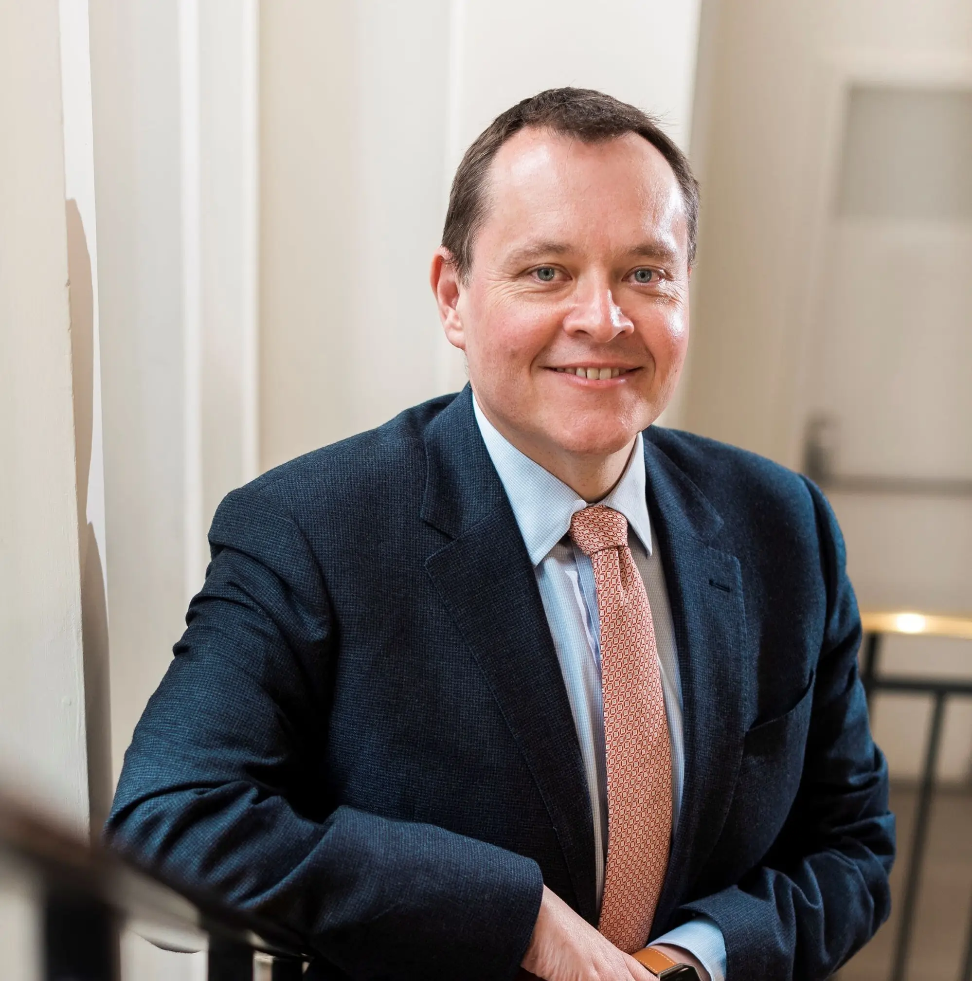Paul Newman, Greensleeves Care CEO, smiling headshot stepping down to join We Care Group and Summit Care Group