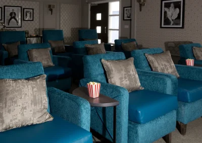 Cinema room at Henley House Care Home in Ipswich – cosy theatre-style seating for residents to enjoy films
