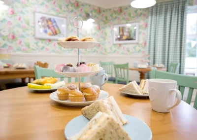 tea and cakes in a warm, friendly setting