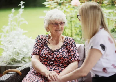 Care Home Resident and Team Member interacting at Pelsall Hall in Walsall