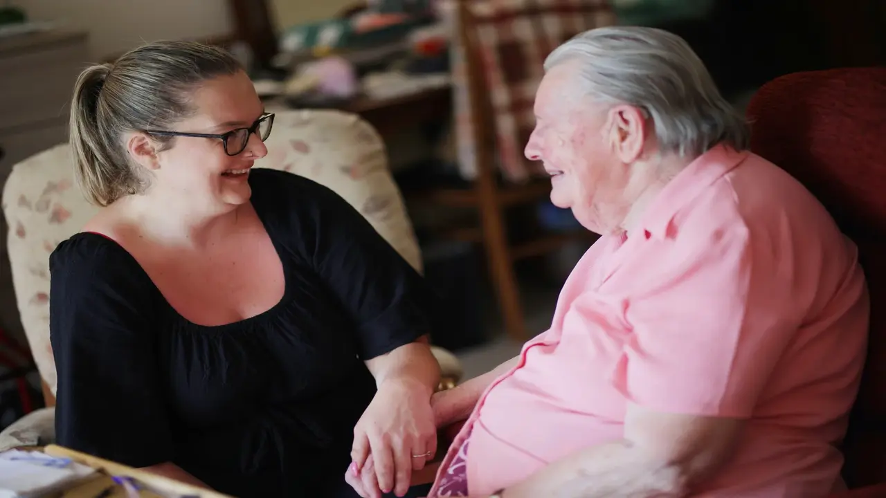 thumbnail image of Care home resident and relative discussing care at Greensleeves Care