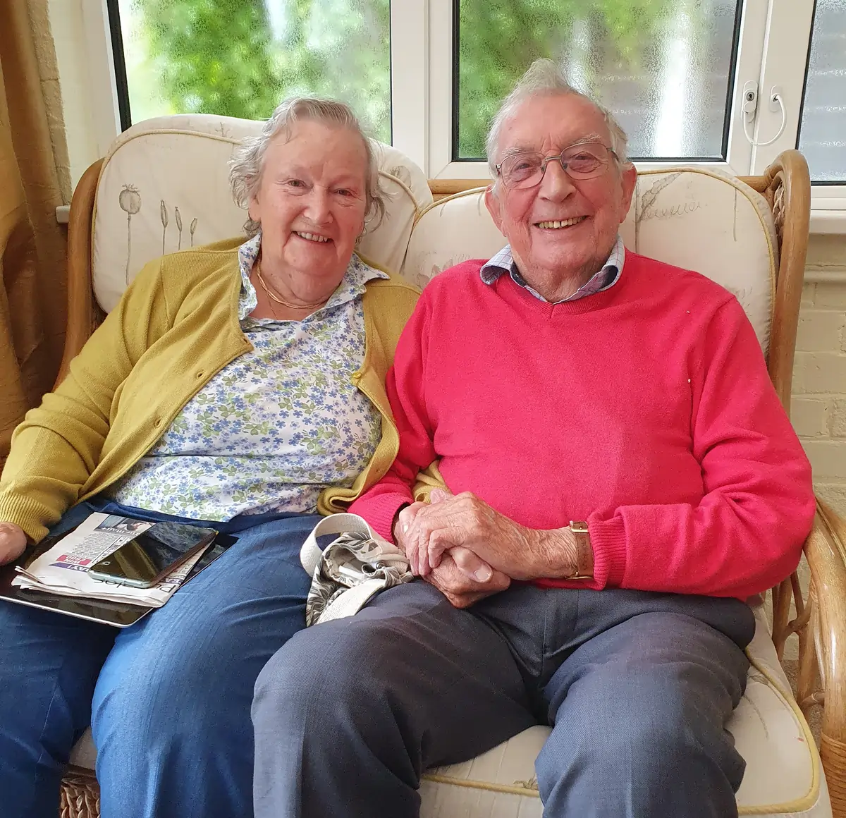 George and Mary, a couple living together at Tickford Abbey Care Home, enjoying time side by side.