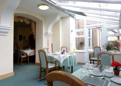 Set dining room at Grosvenor House Care Home in St Leonards-on-sea