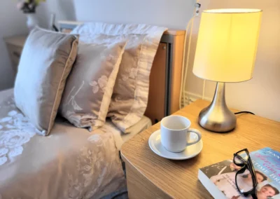 bedside table in a bedroom at Grosvenor House care home in St. Leonards-on-Sea