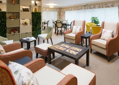 Comfortable lounge and activity area at Clarendon Lodge Care Home