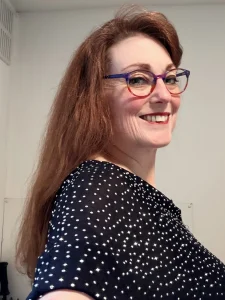 Michelle George, pictured before shaving her head for the dementia research fundraiser