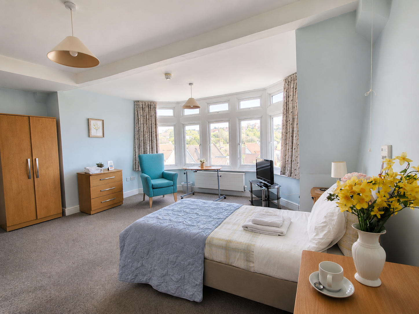 Grosvenor House serviced apartment double bedroom with bay windows