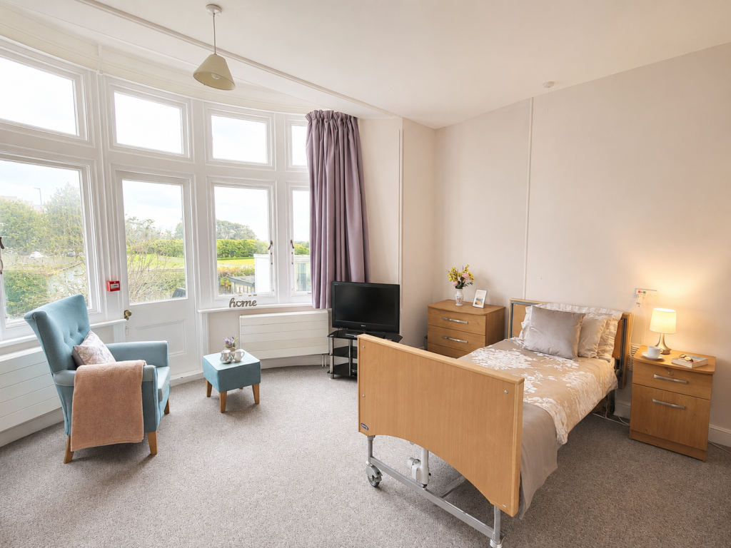 Grosvenor House bedroom with bay window and hospital bed