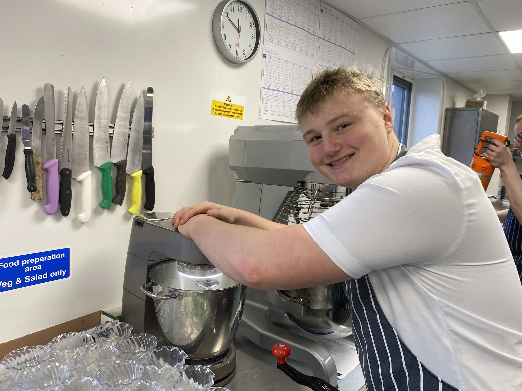 Apprentice chef training at Greensleeves Care catering kitchen